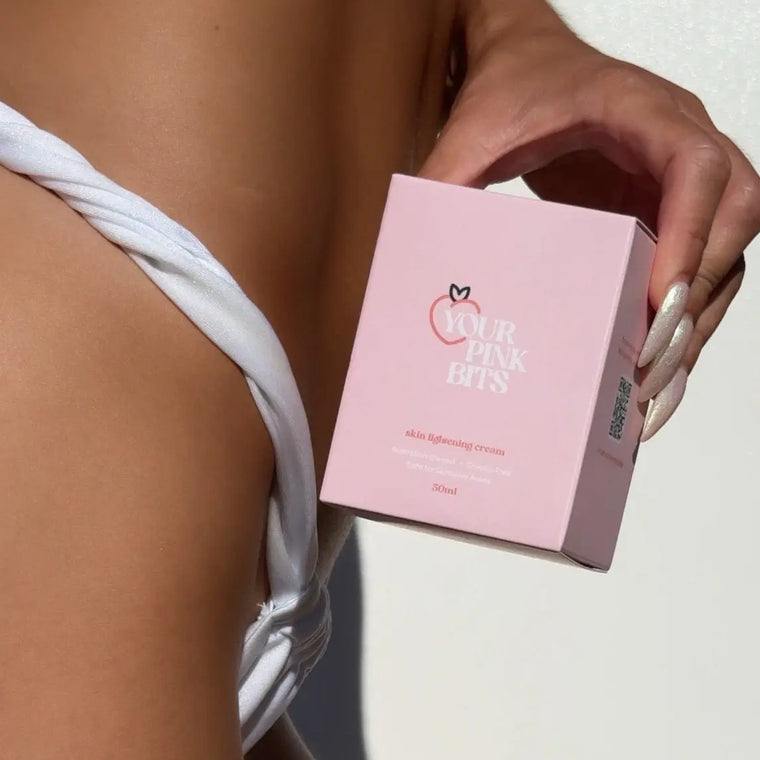 Hand holding Your Pink Bits intimate brightening cream